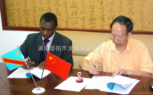 Congo (DRC) customer and Liao Shiming general manager signed a contract